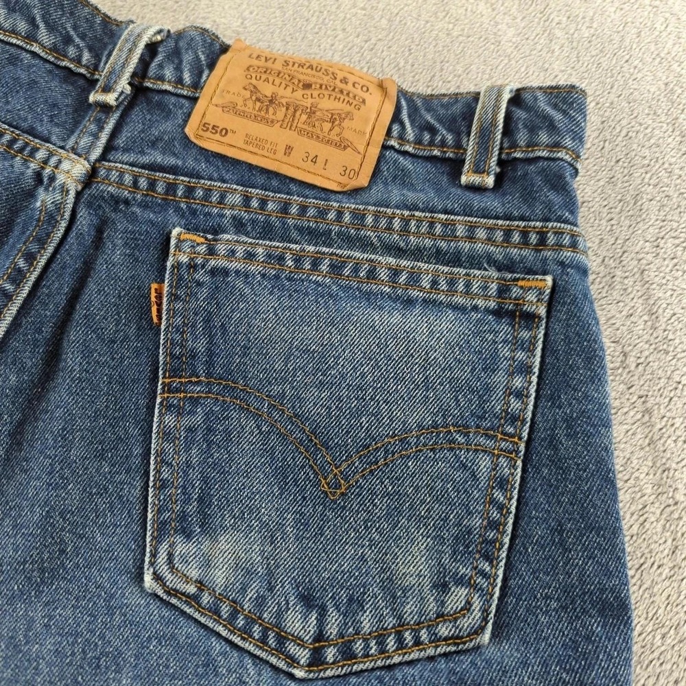 Vintage 90s Levis Orange Tab Jeans 34x30 (Fits 32x30) Blue 550 Baggy Made in USA